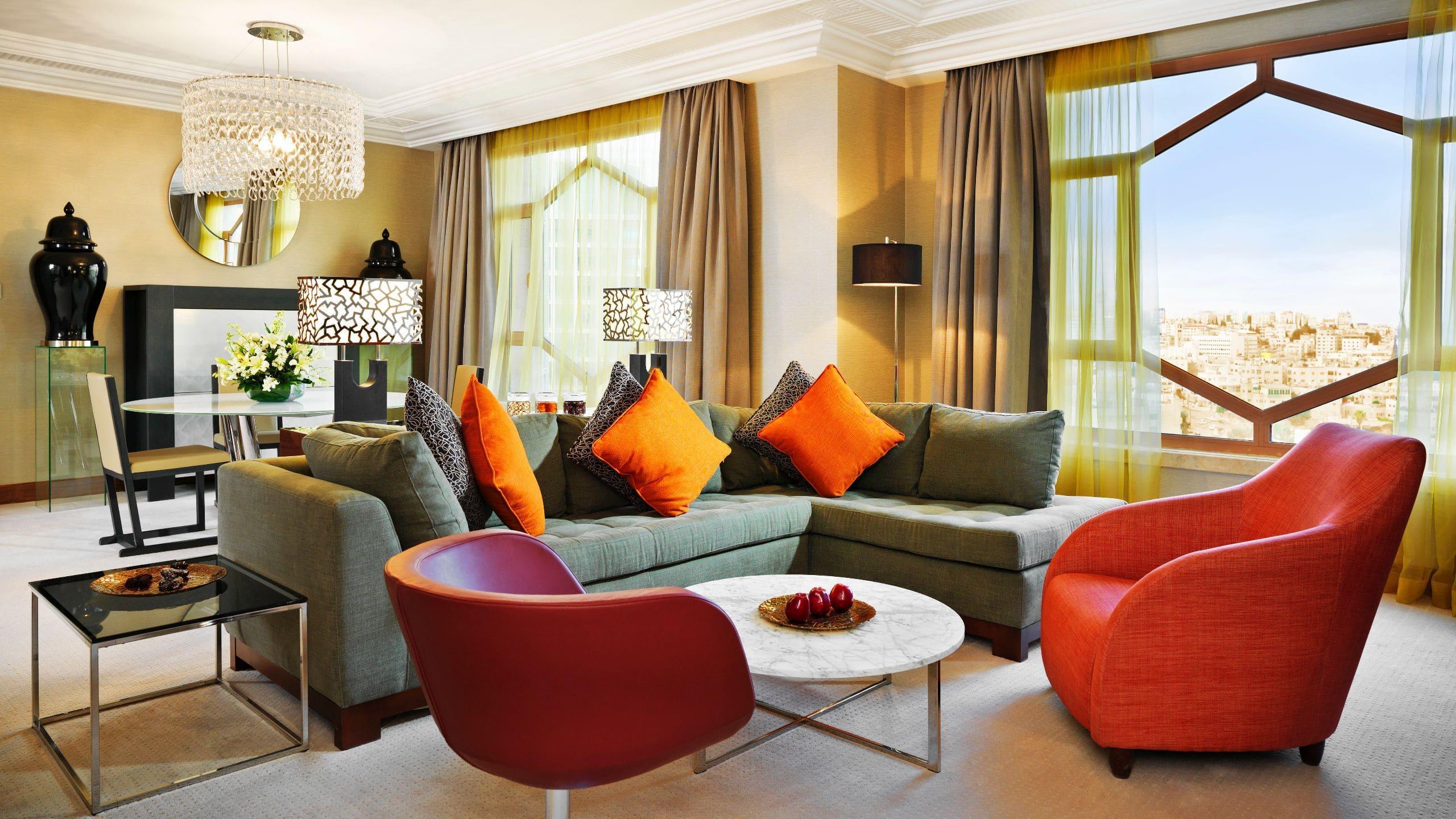 جراند حياة عمان المظهر الخارجي الصورة A living room at the hotel