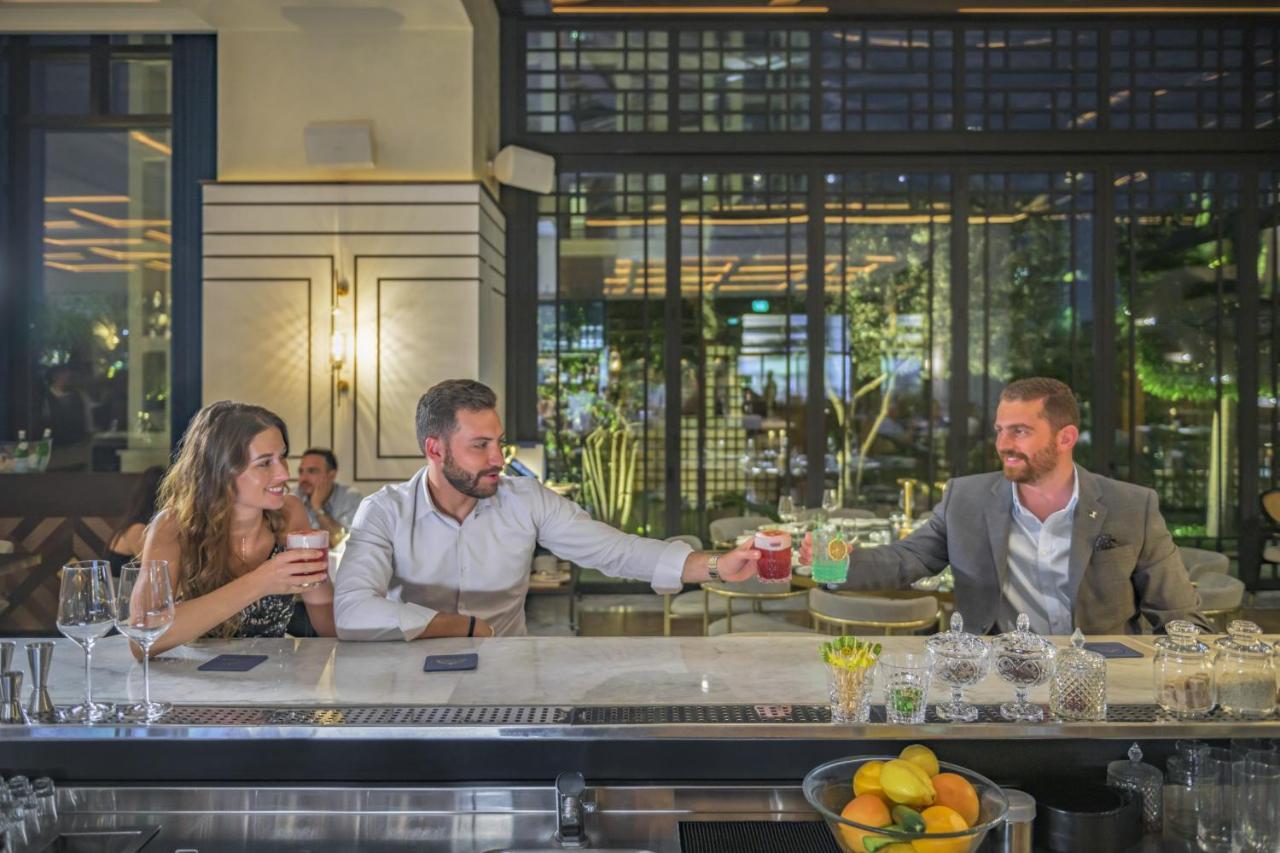 جراند حياة عمان المظهر الخارجي الصورة The bar at the hotel