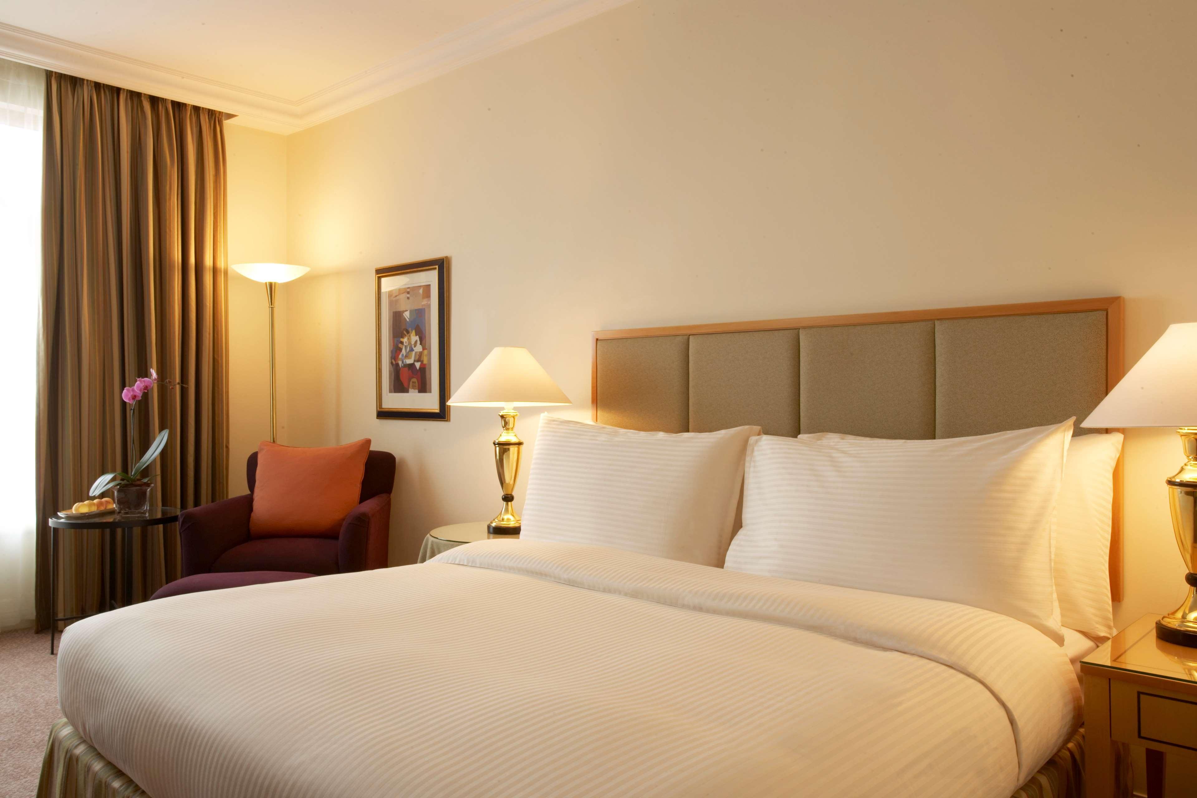 جراند حياة عمان المظهر الخارجي الصورة A bedroom at the hotel
